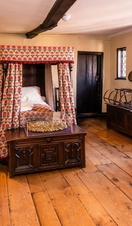 A replica of a historic bedroom at Stranger's Hall in Norwich