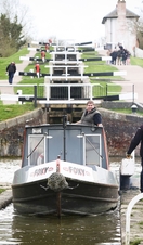 A barge sailing through Foxton Locks in Leicestershire