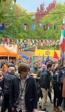 Crowds of people shopping at Gloucester Green Market in Oxford