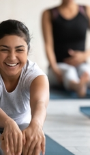 A group of people in a yoga class