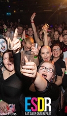 A group of people posing during a club night at Queenshilling in Bristol