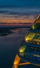 Night time view of a modern restaurant inside a tower