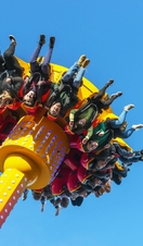 People riding a fairground ride