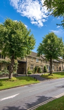 The main street in Burford village on a sunny day
