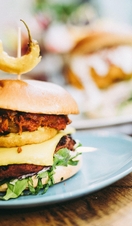Closeup shot of vegan burgers on a table in a restaurant