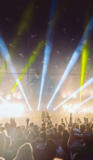 A band performing on stage at Rattler Festival in Cornwall