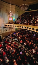 An audience watching a performance in the Theatre Royal in Windsor