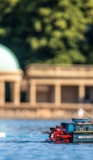 A model boat sailing on Eaton Park Boating Lake