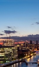 Night view of London from height. Glittering landscape