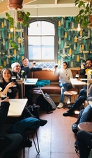 A group of people drinking wine as part of a food tour in Brighton