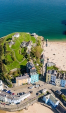 Aerial view of a sandy beach in a picturesque resort (Castle Beach, Tenby, Wales)