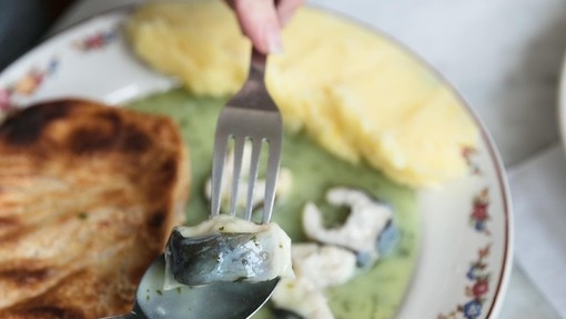 Manzes pie and mash being eaten at a restaurant in Peckham, London