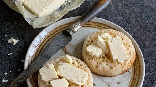 Caerphilly cheese on crumpets, served on a plate