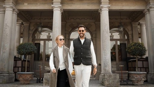 Young couple walking outside Cliveden House
