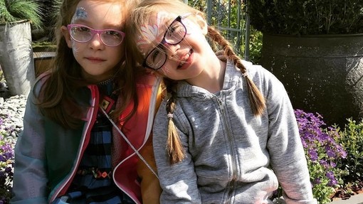 Two children wearing face paint at the RHS Flower Show in Cardiff