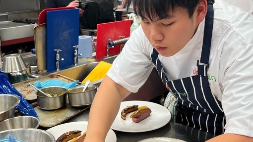 Chef preparing food in restaurant