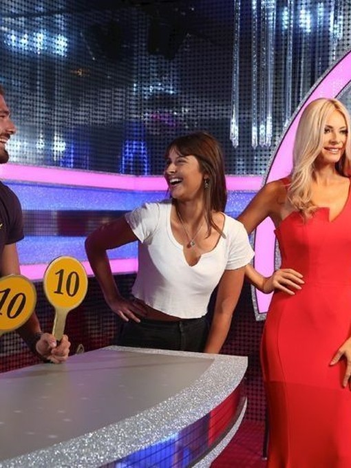 A couple enjoying waxworks at Madame Tussauds Blackpool.