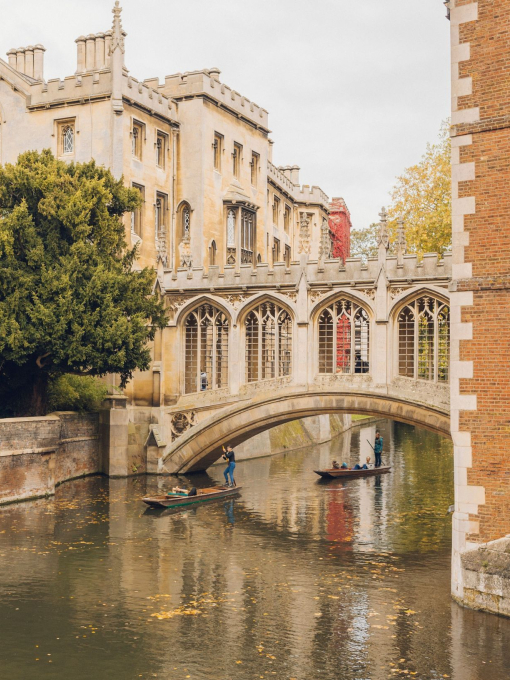 View of a river with an arched bridge across