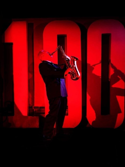 A jazz performer on stage at the 100 Club, an intimate and historic venue in the heart of London's Soho district