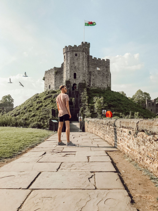 Man looking out at the castle view