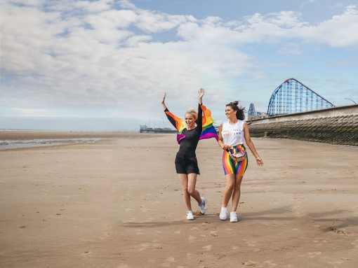 Two women having fun on Blackpool beach