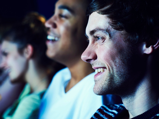 Geeky guy and girl on a date at the movies