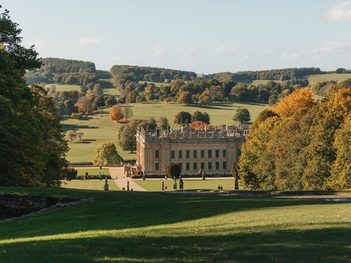 Exterior view of country house and gardens in autumn