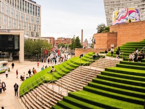 Outdoor grassy steps of a shopping centre