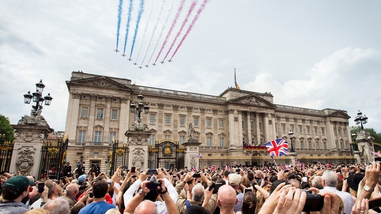 Aerial display flying over crowds above palace