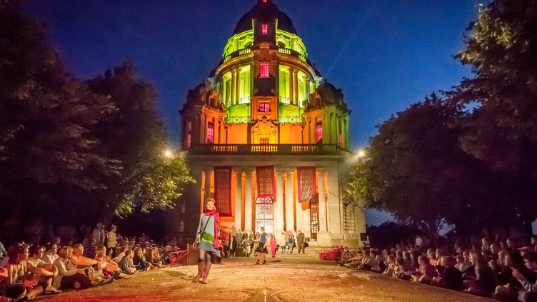 A performance onstage outdoors at The Dukes Theatre in Williamson Park, Lancashire