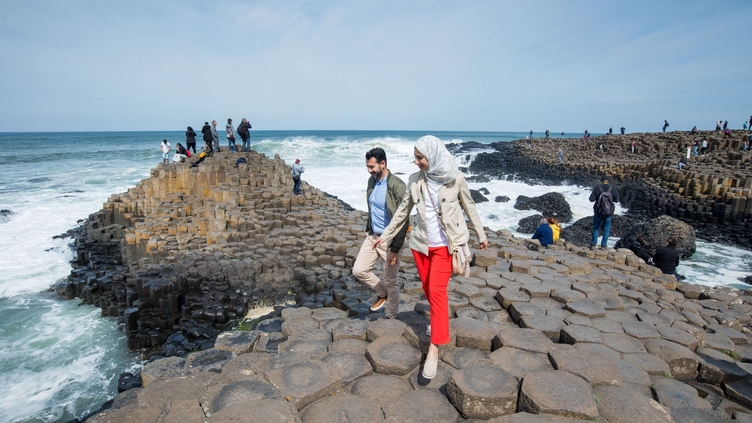 People walking on the Giants Causeway 