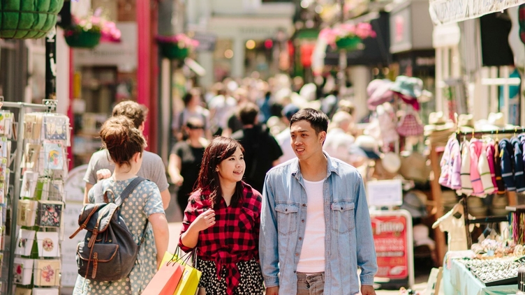 Crowds of people on the streets on a summer's day shopping