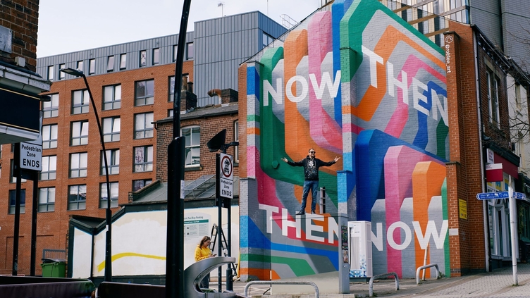 An artwork adorning a building in the heart of Sheffield