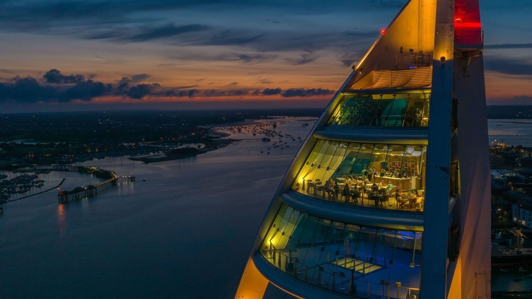 Night time view of a modern restaurant inside a tower