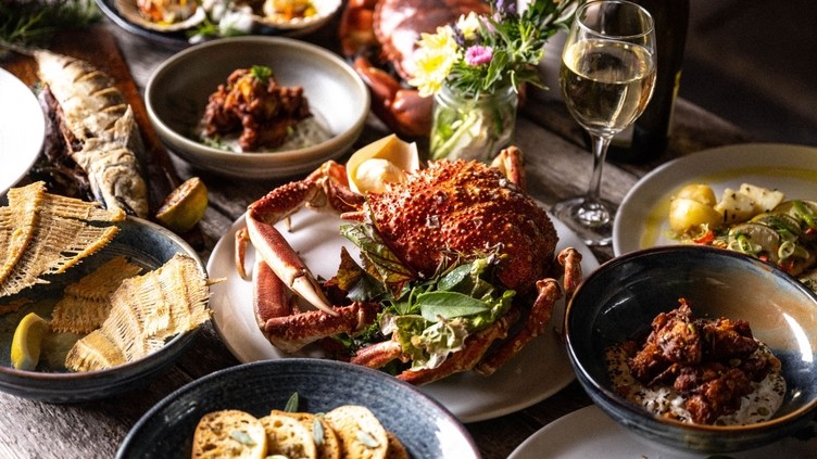 Table with a number of dishes of food