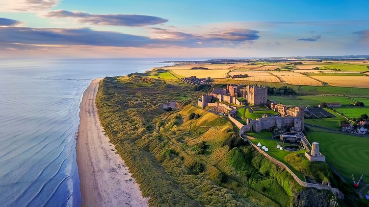 Aerial view of Bamburgh Castle on the coast of Northumberland