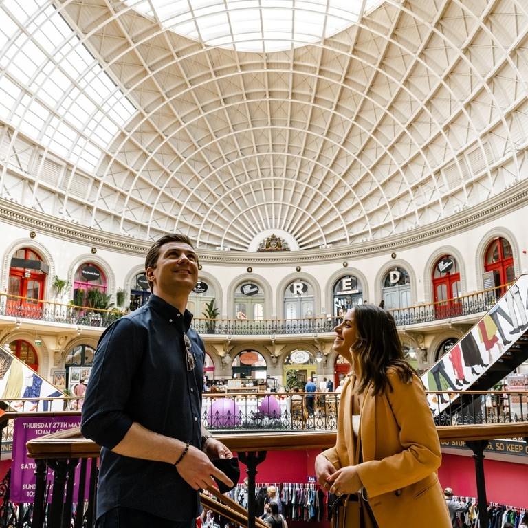 People looking around the interior of Leeds Corn Exchange