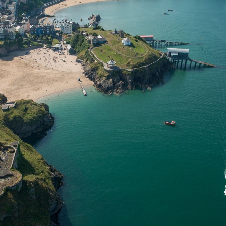 Traditional seaside town with sandy beaches. Aerial view