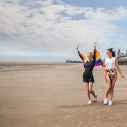 Two women having fun on Blackpool beach