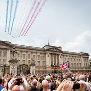 Aerial display flying over crowds above palace
