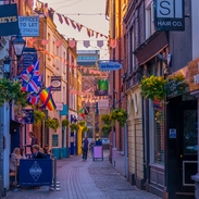 A view down a shopping street in Exeter's Castle Quarter