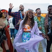 A group of friends having fun at a festival.