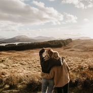 UK- Scotland- Loch Lomond and the Trossachs National Park- rear view of female friends looking at view