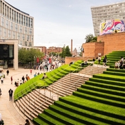 Outdoor grassy steps of a shopping centre