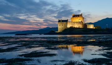 Aerial view of castle and surrounding countryside